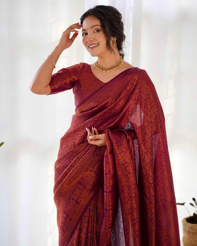 Kuber Pattu Silk Saree, Exuding Regal Charm With Its Rich Pallu And Intricate Brocade Blouse, Elegantly Adorned With Enchanting Tassels On The Saree's Edge.