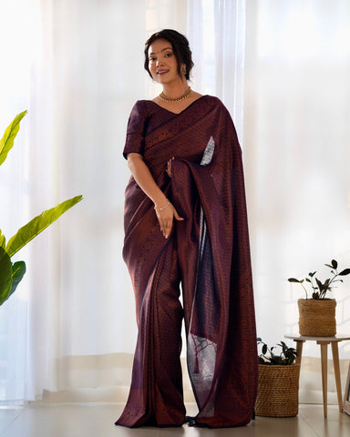 Kuber Pattu Silk Saree, Exuding Regal Charm With Its Rich Pallu And Intricate Brocade Blouse, Elegantly Adorned With Enchanting Tassels On The Saree's Edge.
